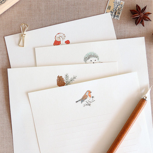 Woodland-themed letter paper set featuring hedgehog, robin, pine cone and mushroom illustrations on ivory paper, vintage natural stationery for handwritten letters